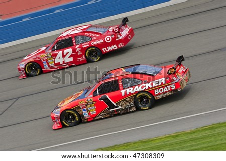 Fontana, CA - FEB 21, 2010:  Team Ganassi travel through the turns during the Auto Club 500 race a the Auto Club Speedway in Fontana, CA on Feb 21, 2010