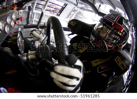 FORT WORTH, TX - APR 16: Joey Logano gets ready to practice at the Texas Motor Speedway for the running of the O\'Reilly Auto Parts 300 race on Apr 16, 2010 in Fort Worth, TX.