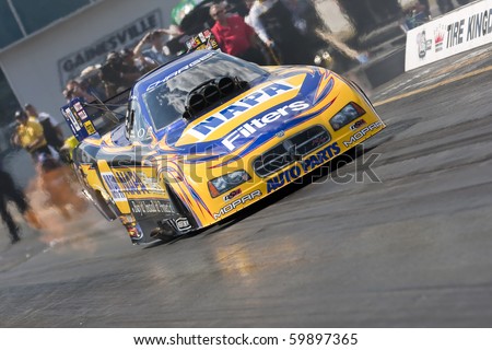 GAINESVILLE, FL - MARCH 13:    NHRA Funny Car driver, Ron Capps, brings his car down the track during the 41st Annual Gatornationals at the Gainesville Raceway in Gainesville, FL, March 13, 2010