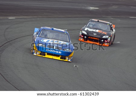 LOUDON, NH - SEP 18:  Kurt Busch brings his Miller Lite Dodge through the turns during practice for the Sylvania 300 race at the New Hampshire Motor Speedway in Loudon, NH on Sept 18, 2010