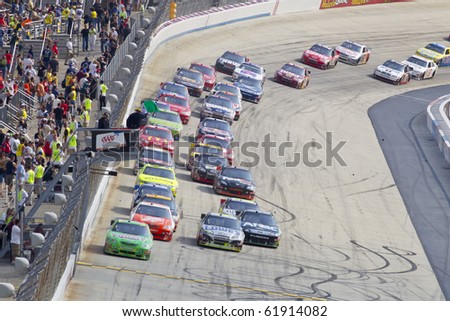 DOVER, DE - SEP 26:  The NASCAR Sprint Cup Series teams take to the track for the AAA 400 race at the Dover International Speedway in Dover, DE on Sep 26, 2010.