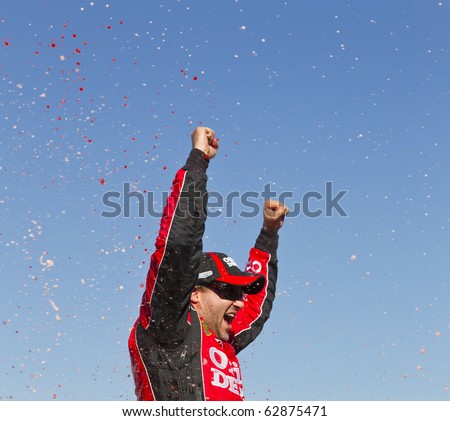 FONTANA, CA - OCT 10:  Tony Stewart holds off the rest of the Sprint Cup teams to win the Pepsi Max 400 race at the Auto Club Speedway in Fontana, CA on Oct 10, 2010.