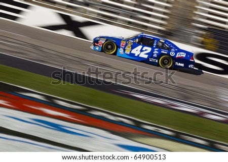 FORT WORTH, TX - NOV 06:  Juan Pablo Montoya car through the frontstretch during a practice session for the AAA Texas 500 race on Nov 6, 2010 at the Texas Motor Speedway in Fort Worth, TX.
