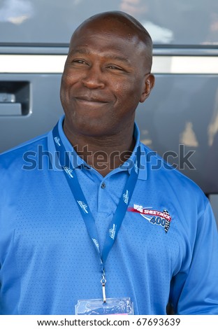 JOLIET, IL - JUL 15: NFL Chicago Bears head coach, Lovie Smith, poses for photos at the USG Sheetrock 400 NASCAR NEXTEL Cup race on July 15, 2007 in Joliet, IL.
