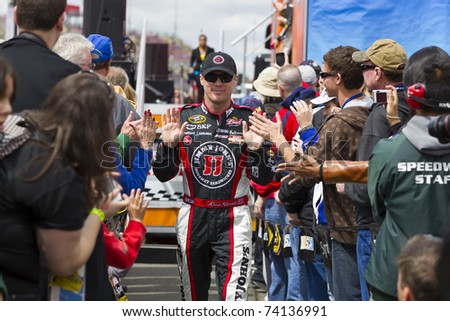 FONTANA, CA - MAR 27:  Kevin Harvick (29) walks through the line of fans before the start of the Auto Club 400 NASCAR Sprint Cup race at the Auto Club Speedway in Fontana, CA on Mar 27, 2011.