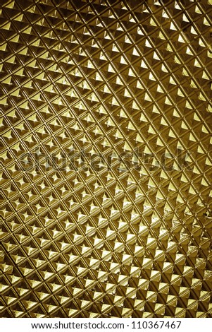 gold, yellow Metal glass texture background closeup