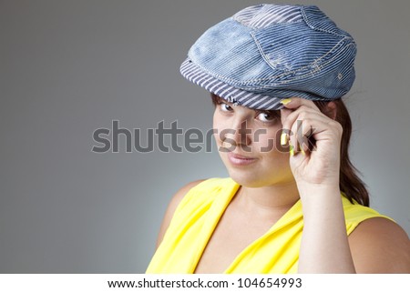 Girl in a denim cap