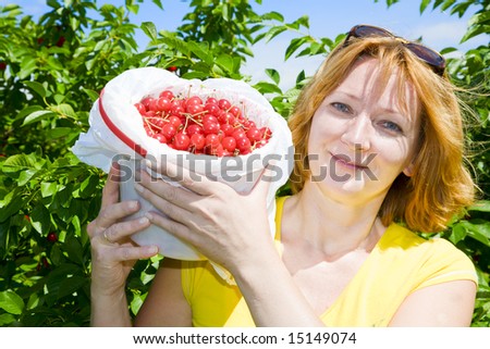 Woman with cherries