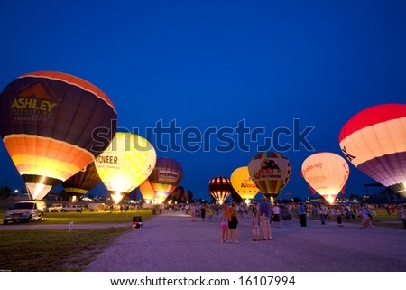 Indianapolis, IN - August 5: hot air balloons light up the evening sky at the Indiana state fairgrounds