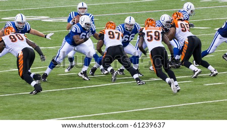 INDIANAPOLIS, IN - SEPT 2: The play begins during football game between Indianapolis Colts and Cincinnati Bengals on September 2, 2010 in Indianapolis, IN