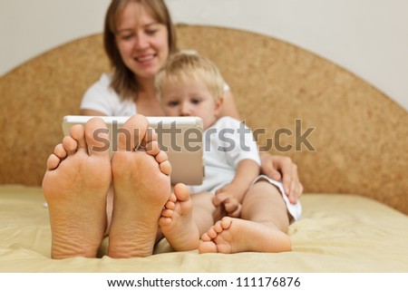 family with touch pad at home