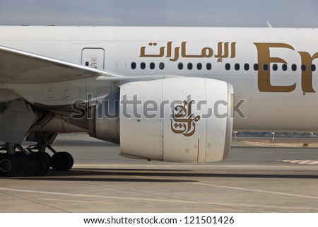 DUBAI, UNITED ARAB EMIRATES - NOVEMBER 10: Engine of Emirates Boeing 777 at Dubai Airport on November 10, 2012 in Dubai, UAE. Emirates is rated as top 10 best world airline flying on youngest fleet