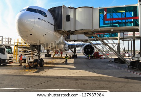 DUBAI, UAE - DECEMBER 26: Emirates Boeing 777 at Dubai Airport on December 26, 2012 in Dubai, UAE. Emirates is rated as a top 10 best airline in the world flying on youngest fleet.