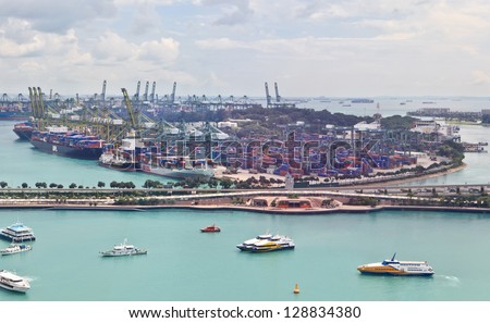 SINGAPORE - DECEMBER 28: Singapore industrial port on December 28, 2012 in Singapore. It\'s world\'s busiest port in terms of total shipping tonnage, transfers fifth of the world shipping containers.