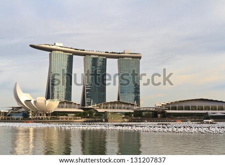 SINGAPORE - DEC 27: Marina Bay Sands complex on sunset on December 27, 2012 in Singapore. Marina Bay Sands is an integrated resort and billed as the world\'s most expensive standalone casino property