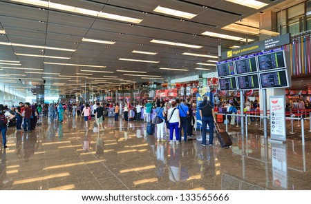 SINGAPORE -DEC 30: Interior of Changi airport on December 30, 2012 in Singapore.  Airport is major aviation hub in Asia with throughput exceeding 51 mln passengers per year.