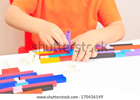 hands, of little boy playing with toys, early education concept