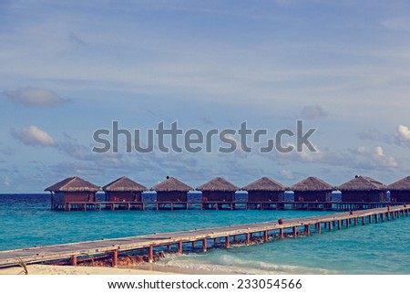water villas in tropical sea resort