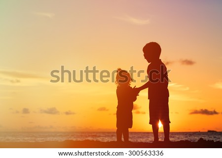 Little Boy And Girl Holding Hands At Sunset Beach Stock Images Page Everypixel