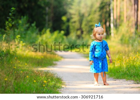 cute little girl walking in summer forest, kids summer outdoor activities