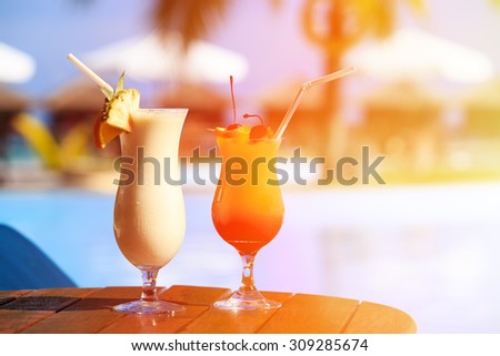 Two cocktails on luxury tropical beach resort