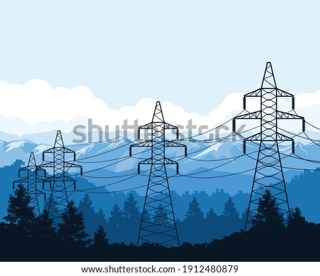 Tangent towers in mountains, high voltage power line pylons, power supply