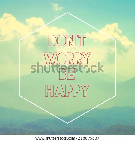 Don\'t worry be happy inspirational quotation with landscape picture as background  with retro filter effect