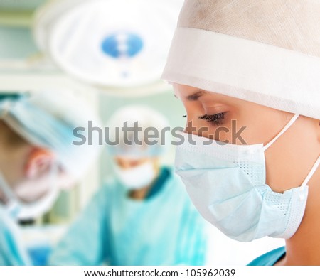 Similar – Image, Stock Photo Female surgeon in operating theater