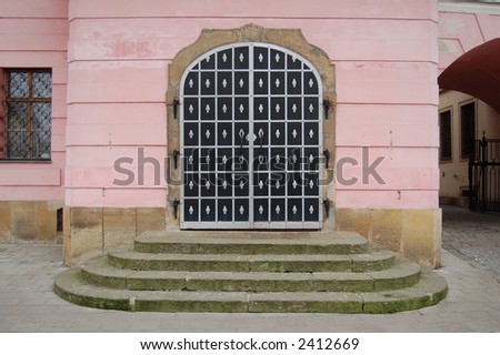 Large and solid door with stairs