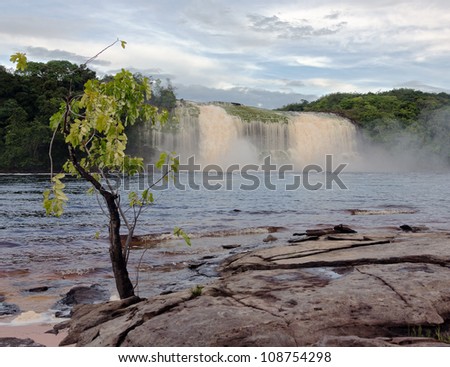 Hacha waterfall in the lagoon of Canaima national park after the storm - Venezuela