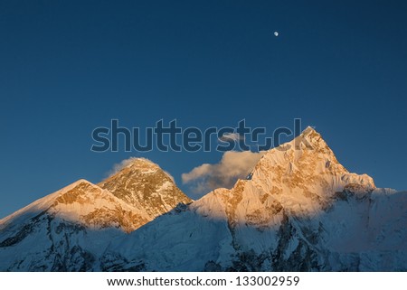 The Moon, Mt. Everest (8848 m), and Nuptse (7864 m) in the evening (view from Kala Patthar) - Nepal, Himalayas