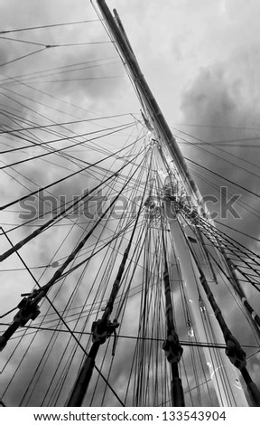 Gear old sailing ship on the background of an overcast sky - Turku, Finland (black and white)