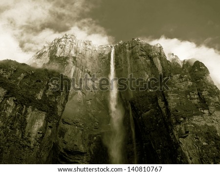 Angel Falls ( Salto Angel ) is worlds highest waterfalls (978 m) in the early morning - Venezuela, Latin America (stylized retro)