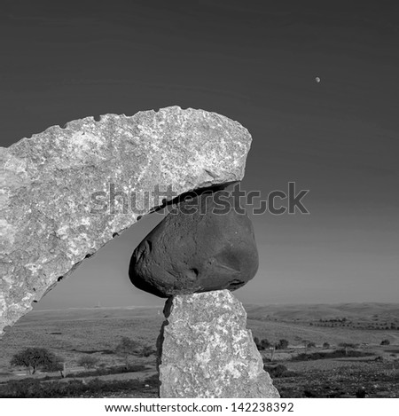 BEER SHEVA, ISRAEL - AUGUST 27: The moon over the Park in the Negev desert. The sculptures have been restored in the park near Beer Sheve August 27, 2012 in Israel (black and white)