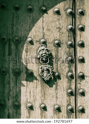 Ancient door on one of the streets in the old town - Cusco, Peru (stylized retro)
