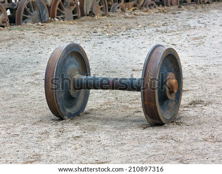A pair of wheels from the locomotive at antique Train cemetery - Uyuni, Bolivia