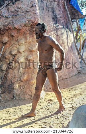 BUITEROS, NAMIBIA - JULY 17, 2014: Portrait hunter Bushman. The San people, also known as Bushmen are members of various indigenous hunter-gatherer peoples of Southern Africa
