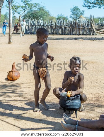 FRANSFONTEIN, NAMIBIA - JULY 09, 2014: Children from the Himba tribe. The Himba are indigenous peoples living in northern Namibia, in the Kunene region of South-West Africa
