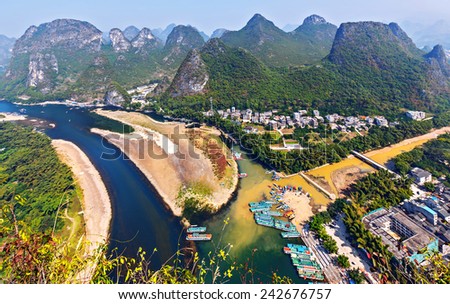 Beautiful karst mountains and the Li River. View from the hill above town of the Hingping - China