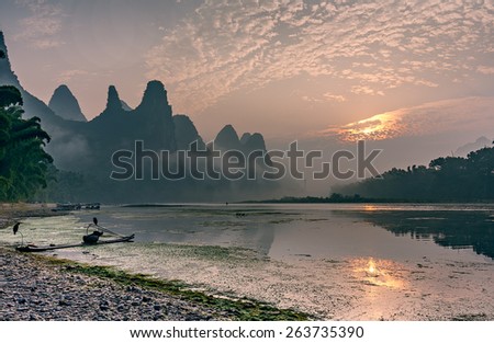 Misty morning on the river at sunrise - The Li River, Xingping