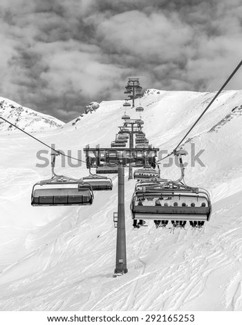 One of chair lifts in a ski resort of a valley of Zillertal - Mayrhofen region, Austria (black and white)