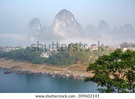 Beautiful karst mountains and the Li River. View from the hill above town of the Hingping - China