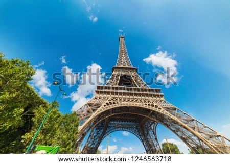 Similar – Image, Stock Photo Under the Eiffel Tower .  With light and shadow . Above me the Great Steel Frame . In the background a skyscraper and many trees.