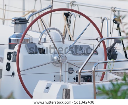 steering wheel on a white boat