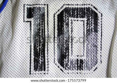 close up of an old basketball jersey number ten
