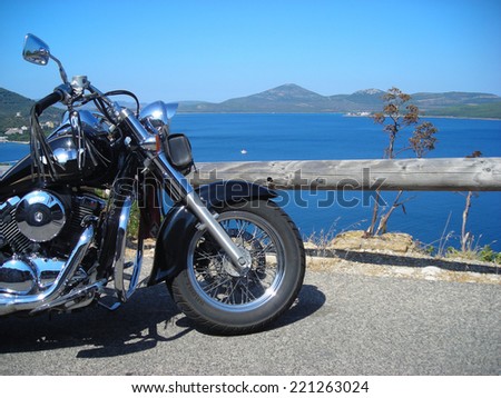 ALGHERO, ITALY-JULY 07, 2011: classic motorcycle by the sea