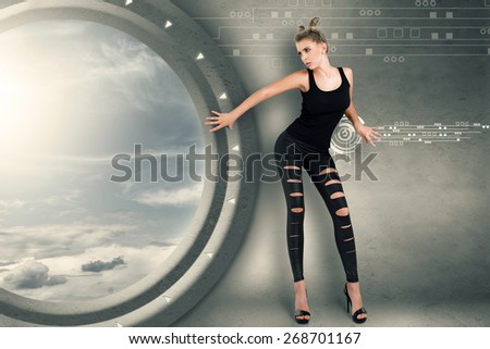 Young woman in futuristic interior playing science fiction crime scene