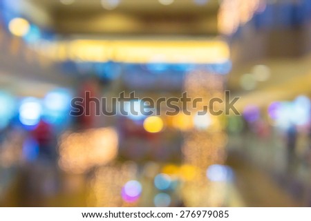 Abstract blurred background of illumination inside of shopping mall