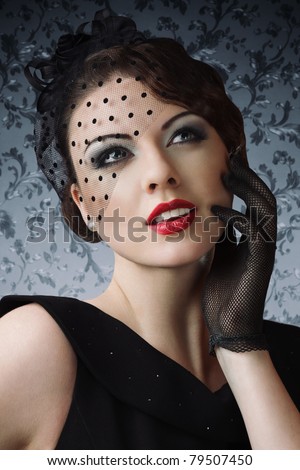 Attractive woman touching lips beauty retro style portrait