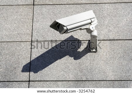 Security cam attached on the wall